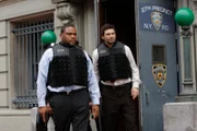 LAW & ORDER -- "Fed" Episode 2011 -- Pictured: (l-r) Anthony Anderson as Det. Kevin Bernard, Jeremy Sisto as Det. Cyrus Lupo -- NBC Photo: Will Hart