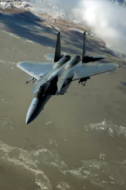 An F15 Eagle from the 173d Fighter Wing, Kingsley Field Air National Guard Base, Oregon, flies over southern Oregon after receiving fuel, Dec. 18, 2012. The Eagle received fuel from a KC-135 from the 151st Air Refueling Wing, Salt Lake City, Utah. (U.S. Air Force photo by Staff Sgt. Staci Miller/RELEASED)