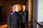 Host James Woods with Robot ready to vote at polling center.