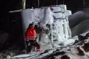 Overhalla, Norway - Jo Roger next to the overturned plow truck.