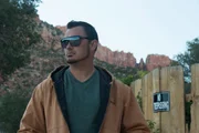 Brandon next to a no trespassing sign.