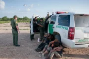 Laredo, TX: Border Patrol agents find people trying to cross the border.