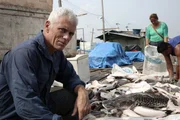 Jeremy Wade on a boat, Amazon River, Near Tabatinga.