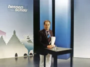 Seit 1986 ist Holger Weinert Reporter und Moderator der "Hessenschau" (Aufnahme aus den neunziger Jahren).