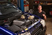 Ant Anstead is with the Cosworth that has no hood.