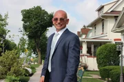 Host Anthony Melchiorri smiles on the streets of Hershey, Pennsylvania,.