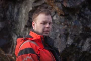 ODDA, Norway - Olav Eike, tow truck driver, looking into the camera. (Photo Credit: National Geographic Channels)