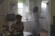 John and Robyn are in the kitchen.