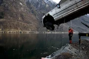 ODDA, NORWAY - Thord under car from the water in the air.