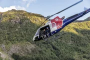 Norway - Bear Grylls and Channing Tatum fly away in a helicopter for National Geographic's RUNNING WILD WITH BEAR GRYLLS. (National Geographic/Ben Simms)