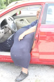 Chuck getting out of his car.
