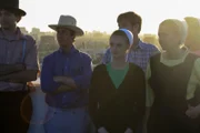 The group enjoys the view of Los Angeles from the balcony.