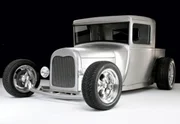 Silver hot rod made from a classic car.