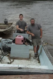Ricky and Christopher on a boat together.
