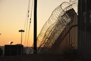 San Diego, CA, USA: The border fence at the San Ysidro port serves as the boundary San Diego and Tijuana. At sunset, car traffic can be extremely slow as workers return from their commutes, with more than 17 million vehicles and 50 million people entering the US in 2005 alone.