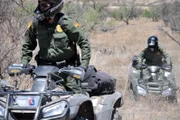 Nogales, Arizona, USA: Border Patrol agents on ATVs through the rugged terrain.   (Photo credit: © NGTV)