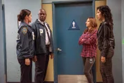 Pictured: (l-r) Melissa Fumero as Amy Santiago, Andre Braugher as Ray Holt, Chelsea Peretti as Gina, Stephanie Beatriz as Rosa Diaz