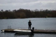 Anders Behring Breivik stands on the mainland looking out to Utoya Island.