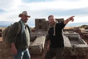 Josh Gates talks with  archaeologist Jose Ignacio Gallego at an ancient Tiwanku site.