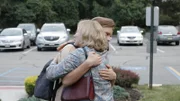 Walter hugs Karen Hull before departing.