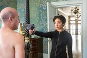 L-R: Viktor (Paul Ben-Victor), Tulip O'Hare (Ruth Negga)