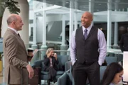 On right: Spencer Strasmore (Dwayne Johnson)