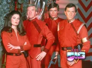 Diana (Jane Badler), John (Richard Herd), Brian (Peter Nelson) und Steven (Andrew Prine)
