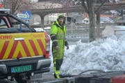 Odda, Norway - Thord Paulsen in Odda, outside the garage. On his way out to rescue a truck.