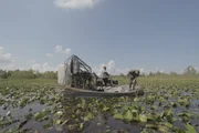 Kip setting alligator traps.