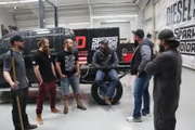 Entire crew discussing a build.