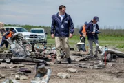 JIAAC Investigator Augusto De Santis (played by John Philip Vazquez) walks amidst the debris of the destroyed Saab 340-A of SOL Lineas Aerias Flight 5428. (Cineflix 2019/Darren Goldstein)