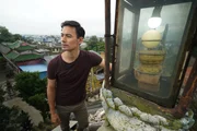 LIZHOU TOWN, XICHANG, SICHUAN, CHINA - George reached the top of the Xinxhan Temple in Lizhou, the lighthouse used to pointing out the direction for passers-by when night falls for hundreds of years.