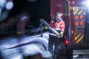 Overhalla, Norway - Roger Heggli (one of Jo Roger´s employees) prepares to help the truck that´s blocking the road.