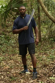 Steve Townes standing in woods.