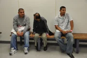 San Diego, CA, USA: Illegal immigrants found attempting to cross the Tijuana-San Diego border wait inside the processing center.