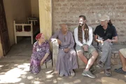 Joe and Ran with a local Egyptian Family outside of their home in Minya.