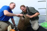 Explorer Pete Kelsey and Josh Gates discover a WWII oxygen tank in Santa Monica Bay.