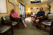 April sits in the waiting room before she meets with Dr. Lee.