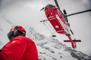 An Air Zermatt comes in for a landing to pick up a patient. // Original Media / Red Bull Content Pool // SI201609020545 // Usage for editorial use only // Please go to www.redbullcontentpool.com for further information. //