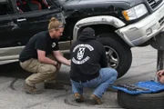 HD and Joel change the tire pressure on the SUV.