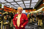 Picture Shows: Wide shot of Bob Lassandrello surrounded by traders on the Chicago Board of Trade cattle futures floor
