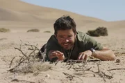 Jamie Crawford the presenter of 'In Too Deep' in the Namibian desert.