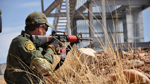 Nogales, Arizona, USA: Customs and border protection Agent Pittman practices shooting with his gun. Agents must train to prepare themselves for fights with drug smugglers and cartels.  (Photo credit: © NGTV)