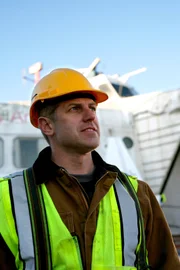 Chad in front of the Princess Anne Hovercraft. (photo credit: National Geographic)