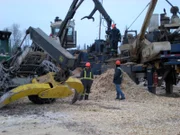 Workers chipping as seen on episode six Ice Loggers of Extreme Loggers.