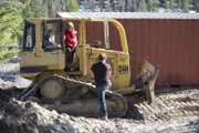 Billy, Bear, and Gabe prepare to move Bear‚Äôs conex container up the mountain.