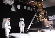 Leland Melvin and Chad Jenkins in astronaut gear at Studio Shotwell in San Francisco.