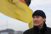Picture Shows: David Hayman with German Flag b/g