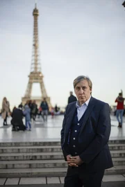 Picture Shows: Andrew Graham-Dixon by the Eiffel tower, in Paris