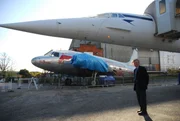 Chris Orlebar next to Concorde.